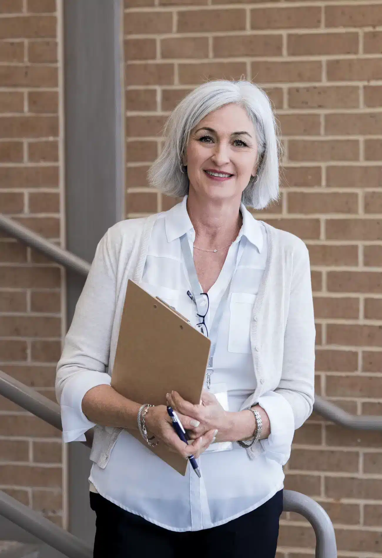 Woman holding a clipboard